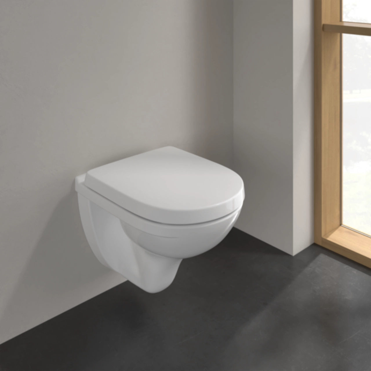 VILLEROY & BOCH O.Novo perem nélküli fali WC lecsapodásgátló WC ülőkével 5688HR01